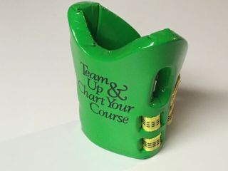 John Deere koozie from a JD Company Parts and Service Meeting, 2