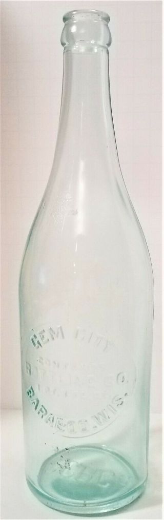 Gem City Bottling Co.  Baraboo,  Wis.  Clear/aqua Embossed Bottle.  1pint 8 Oz