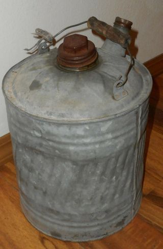 Vintage GALVANIZED METAL KEROSENE/GAS/OIL CAN J&L Ware CAP 2 gallon.  WOOD HANDLE 4
