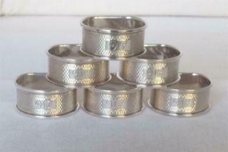 A Stunning Set Of Six Solid Silver Napkin Rings Birmingham 1982 Engine Turned.