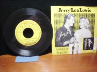 2 Sun 45rpm Records.  1) Jerry Lee Lewis 281 W/sleeve.  2) Johnny Cash 232 No/sleeve
