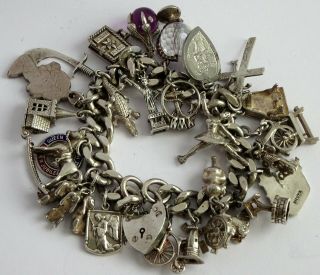 Fantastic Vintage Solid Silver Charm Bracelet & 29 Charms.  Rare,  Open,  Move.  103.  9g