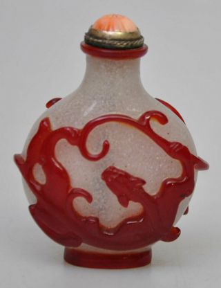 A Chinese Ruby Red Peking Glass Overlay Dragon Snowflake Snuff Bottle Qing