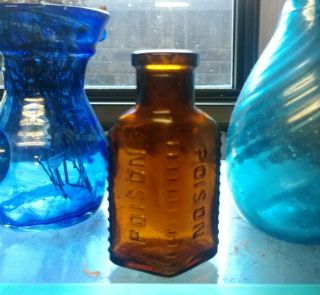 Poison Bottle Antique Amber Embosseglass Bottle 3.  5” Tall Vintage