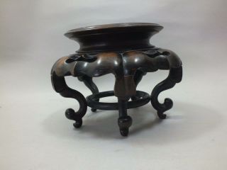 (b) A CHINESE CARVED HARDWOOD DISPLAY STAND ON 5 FEET 19thC 8