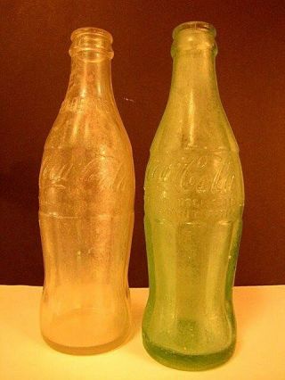2 very old Coca - Cola Bottles,  Green one from Rocky Ford,  Co 2