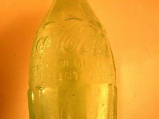 2 very old Coca - Cola Bottles,  Green one from Rocky Ford,  Co 3