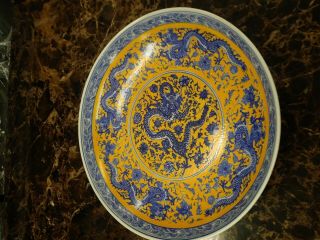 Chinese Qing Dynasty Porcelain Plate Depicting Blue Dragons With Yellow Overglaz