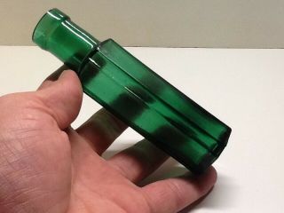 Small Antique Emerald Green Fluted Shoulder Food Bottle.