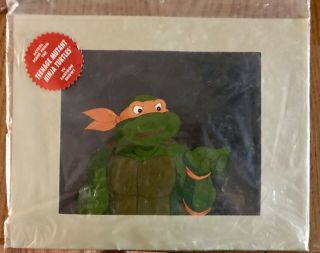 Two 1985 Teenage Mutant Ninja Turtle Animation Cels,  Michaelangelo & April O’nei