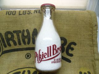Pikiell Bros.  Dairy Products Round Pyro.  Quart Milk Bottle.
