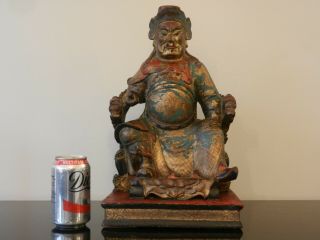 Large Antique Chinese Gilt Polychrome Carved Wooden Seated Deity Figure.