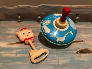 Vintage Toy Top And 1975 Warner Brothers,  Inc.  Porky Pig Rattle.