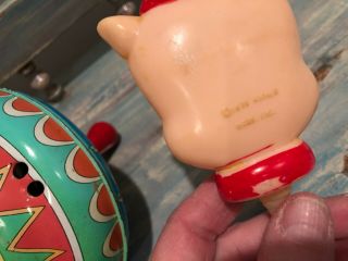 Vintage toy top and 1975 Warner Brothers,  Inc.  Porky Pig rattle. 4