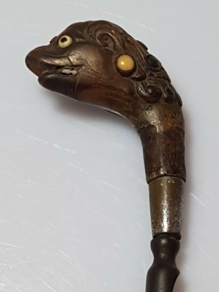 A Very Rare Early Qing Dynasty Metal Hair Iron With Dragon Head Handle