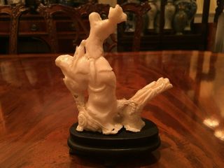 A Chinese Antique Carved White Coral Guanyin with Wooden Stand. 4