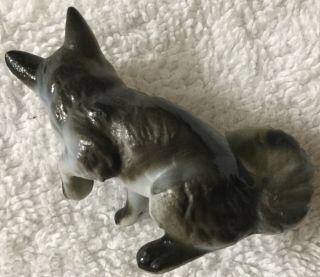 Sitting Fox With Paw Up Figurine
