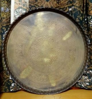HUGE ANTIQUE PERSIAN BRASS TRAVELLING TABLE.  CHASED BRASS TRAY.  FOLDING BASE. 4