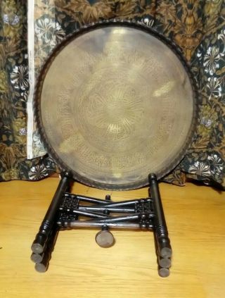 HUGE ANTIQUE PERSIAN BRASS TRAVELLING TABLE.  CHASED BRASS TRAY.  FOLDING BASE. 8