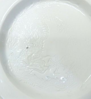 A428: Chinese plate of old white porcelain HAKU - NANKIN with dragon sculpture. 2