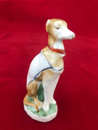 Good 19th Century Staffordshire Pottery Seated Whippet Figure.