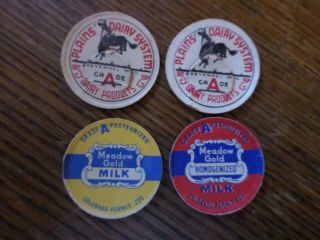 4 Vintage Milk Bottle Caps 2 Plains Dairy System,  Cheyenne Wyo.  2 Meadow Gold