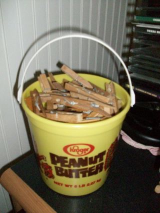 130 Vintage Spring Snap Wood Clothes Pins In Plastic Kroger Peanut Butter Bucket