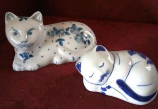Two Blue And White Glazed Porcelain Cat Figurines