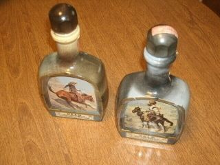 Jim Beam 1979 Two Whiskey Decanters - Frederic Remington - The Cowboy - Indian Trapper