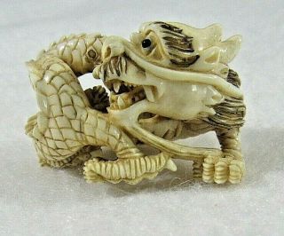 Antique Asian Carved Bone Bovine Dragon Figure