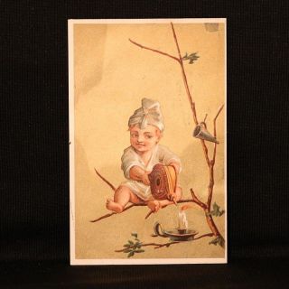Down’s Corset Kid With Candle Trade Card - River Falls Wi