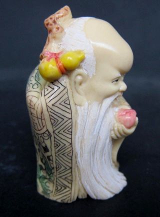 Japanese ivory colored bone Okimono/ netsuke - Longevity Man Offers Peach,  3 