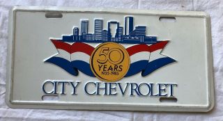 Vintage 1985 City Chevrolet Dealer Metal License Plate 50 Years 1935