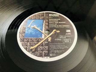 (LP: UK Release) Rush: Roll The Bones [Atlantic 7567 - 82293 - 1] 6