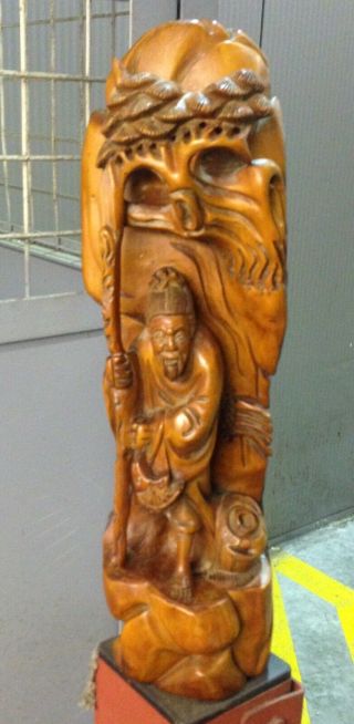 Mid 19th Century Qing Dynasty Chinese Wooden Figure Of A Man With A Staff C1850s