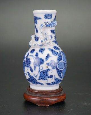 Antique Chinese Porcelain Blue And White Vase With Moulded Dragon & Wooden Stand