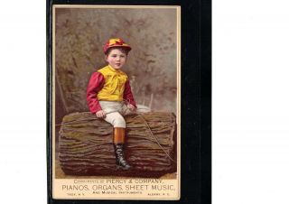 Circa 1881 Victorian Trade Card,  Piercy Pianos,  Boy In Jockey Outfit,  Large
