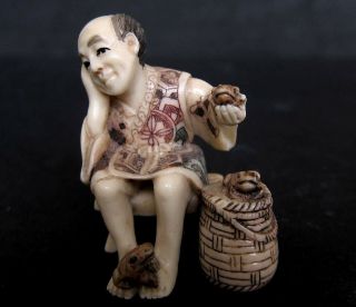 Japanese Ivory Colored Bone Okimono/netsuke - Frog Man Sells Frogs,  Rattan Basket