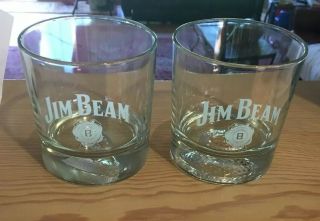Set Of 2 Jim Beam Bourbon Whiskey Glasses.  Golf Ball & Football In Glass Bottom
