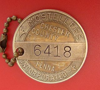 Vintage Charge Plate Coin Tag: Mostellers; Dept Store West Chester Pa