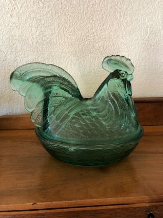 Says hand made in the USA Glass hen on nest dish Says Fenton made USA. 2
