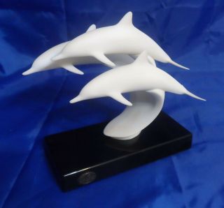 John Perry Figurine W/ 3 Dolphins Or Porpoises On Black Stand
