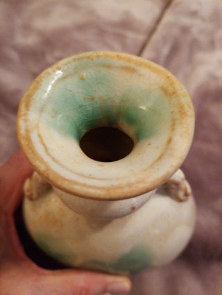 CHINESE EARLY MING CREAM AND GREEN DOUBLE HANDLE VASE.  FOR AGE 3