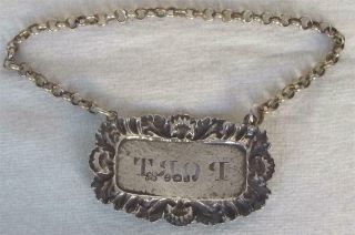 A GEORGIAN SOLID STERLING SILVER PORT DECANTER LABEL LONDON 1826. 6