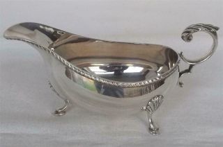 A Stunning Solid Sterling Silver Cream / Sauce Boat Birmingham 1982.