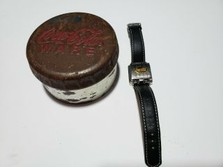 Coca Cola Ware Quartz Popup Watch & Tin.  Leather Strap In
