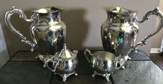 Vintage Footed Oneida Silver Plated 2 Water Pitchers And A Creamer W/ Sugar Bowl