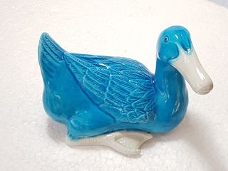 A 1920s Chinese Blue Glazed Porcelain Duck.