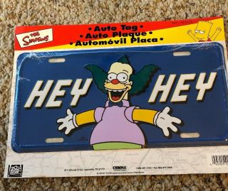 The Simpsons Metal License Plate.  Hey Hey (sh15)