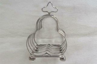 A ANTIQUE SOLID STERLING SILVER SHAPED TOAST RACK BIRMINGHAM 1912. 8